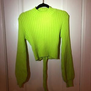 Backless turtleneck ribbed sweater